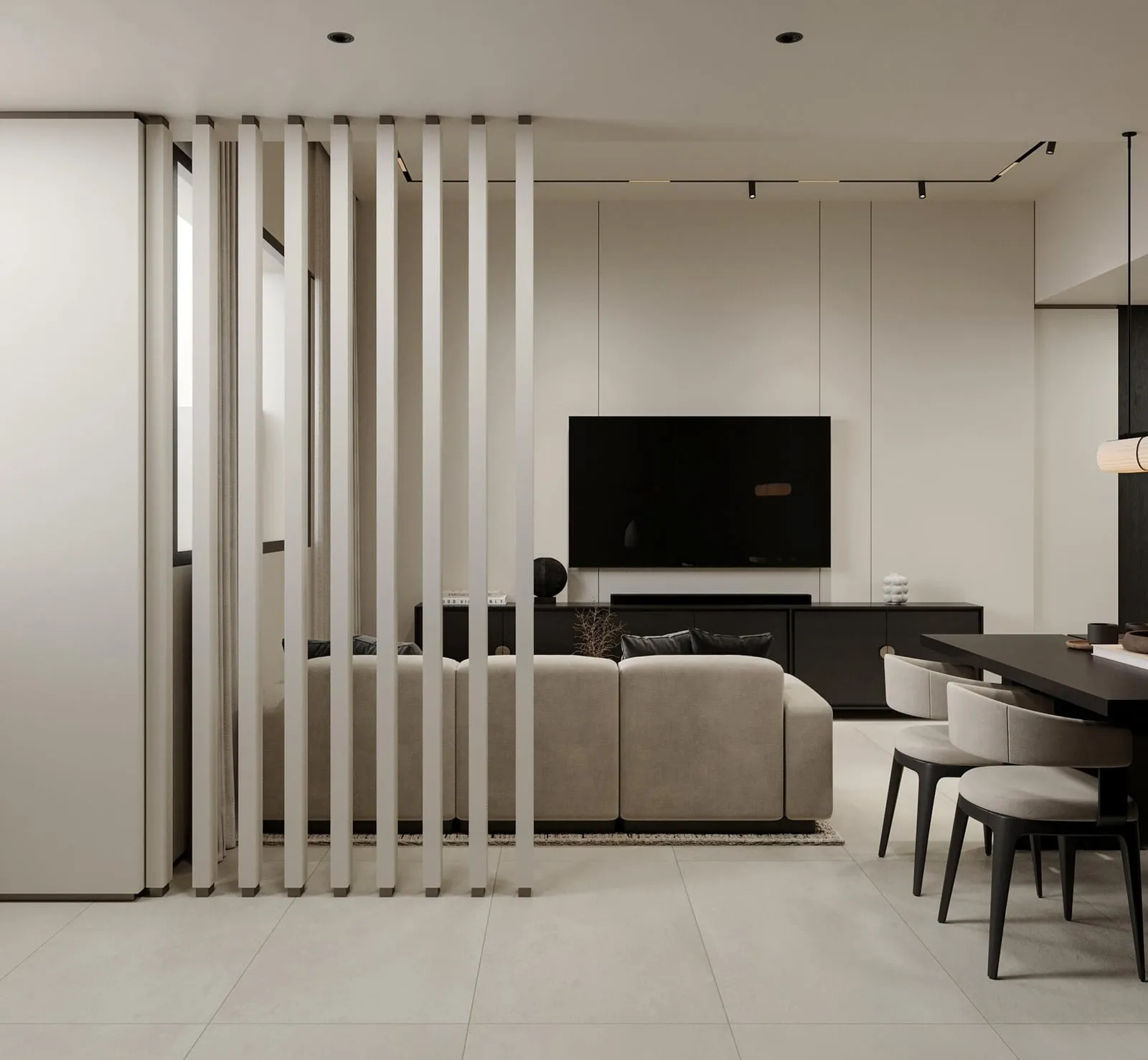 A living room with a slatted timber television wall and the dining table beyond