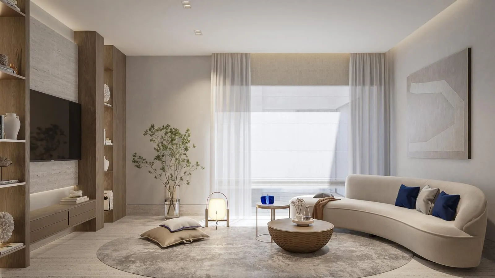 A second living room, a curved sofa on a round rug