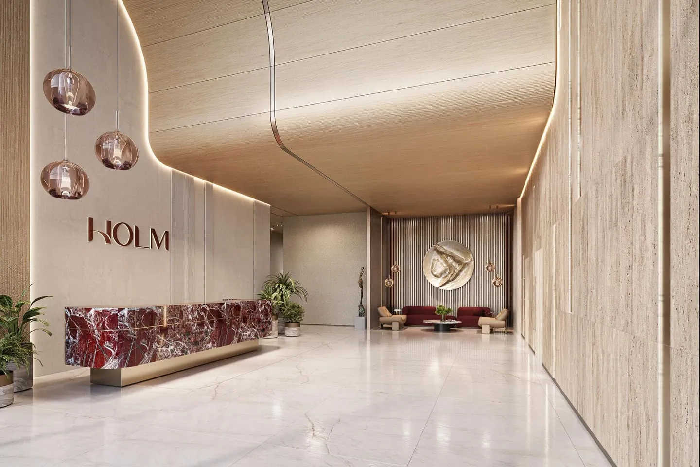 The lobby entrance with the HOLM sign in brass lettering and a sculptural wall piece