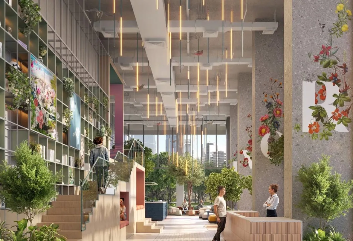 Render of the lobby, with a wall of shelves beside a staircase and hanging lights