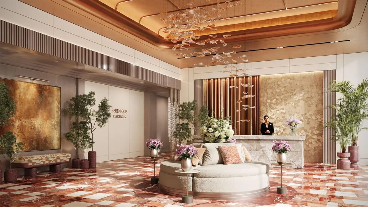 Grand lobby lounge with statement seating on a patterned marble floor.