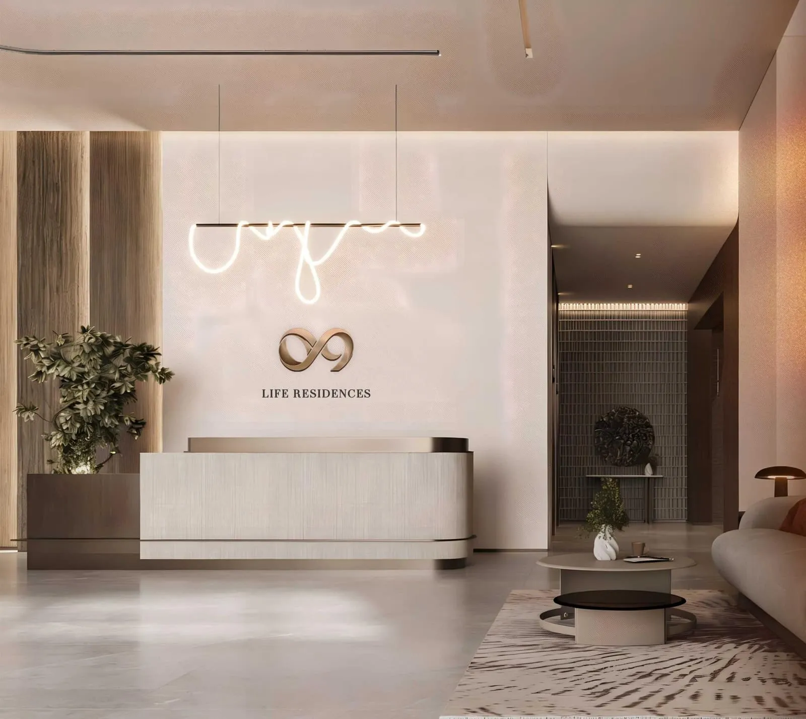 The lobby reception desk beneath the project's script logo in neon, with planting either side