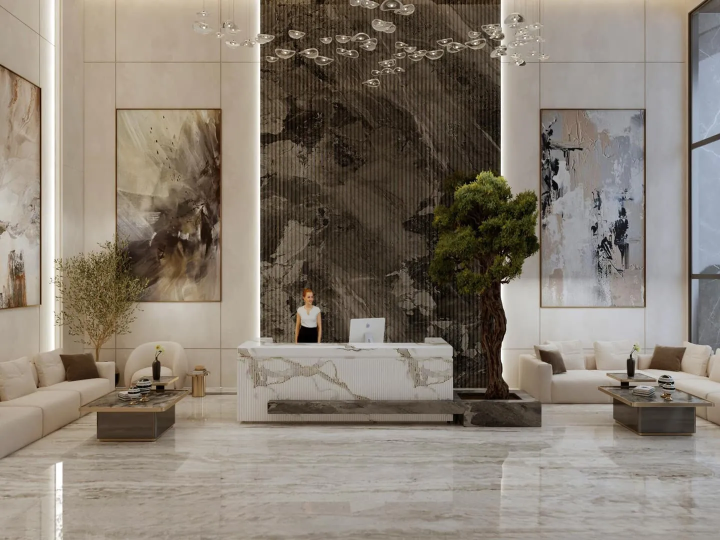 Marble-clad lobby reception area with feature lighting and greenery