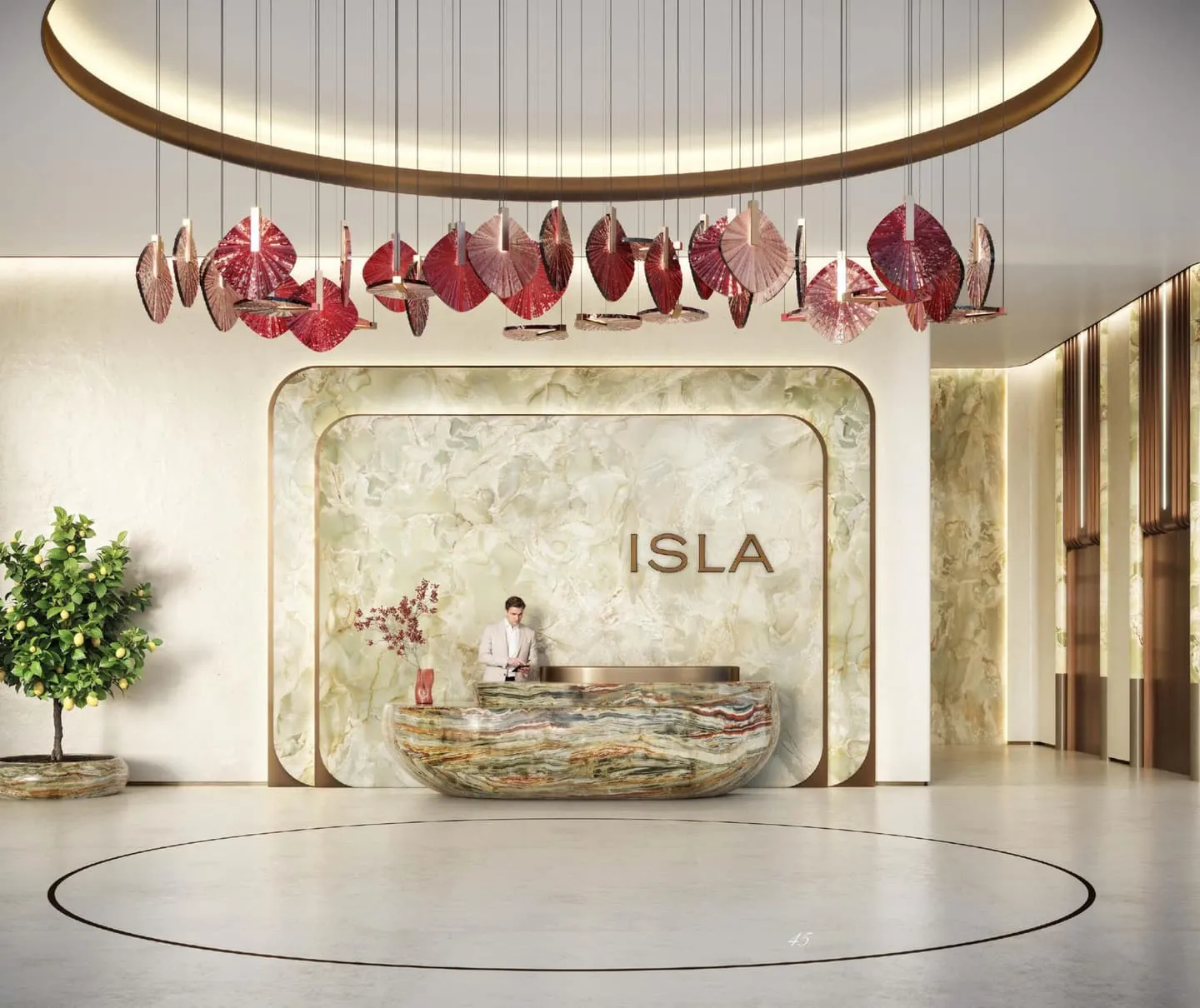 The lobby reception, an onyx desk under a cluster of red shell pendants and the project name on the wall behind