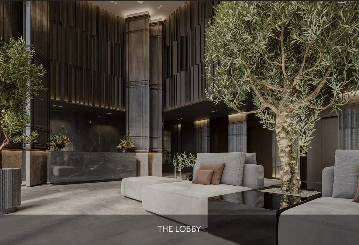 Render of the high-ceilinged lobby, with sofas beneath an indoor tree
