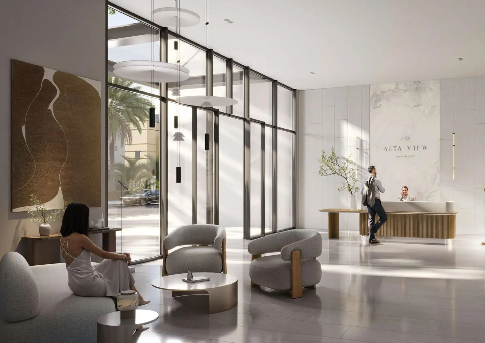 The lobby reception, the project's name lit on the wall behind the desk