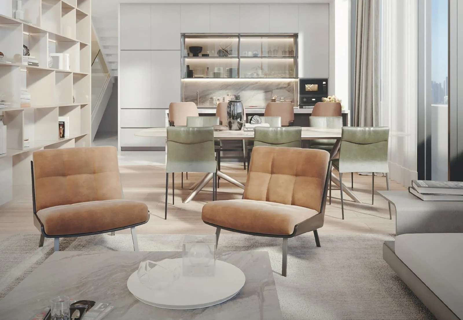 A lounge with two tan leather armchairs, a round white table and open shelving along the back wall