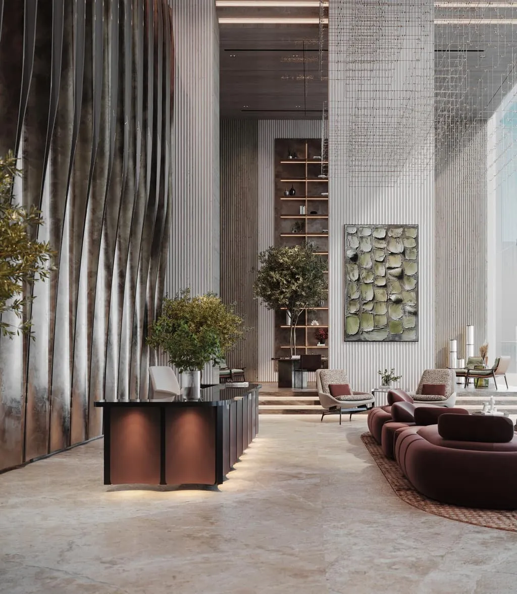 The reception desk in the fin-lined lounge, seating clustered in front of it and a tree beside the entrance
