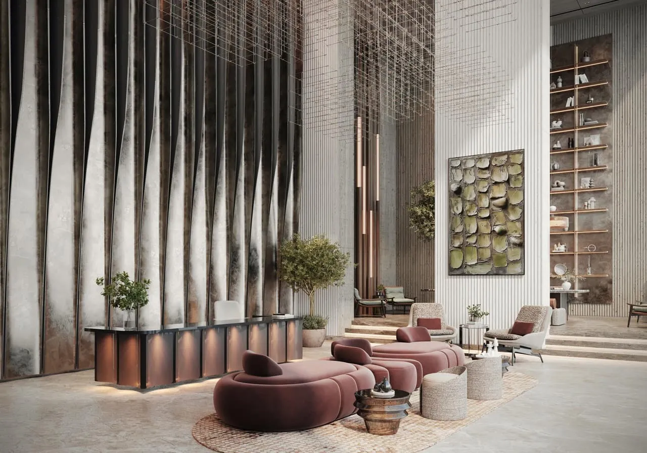 The double height lounge, floor to ceiling timber fins behind curved burgundy seating and low tables