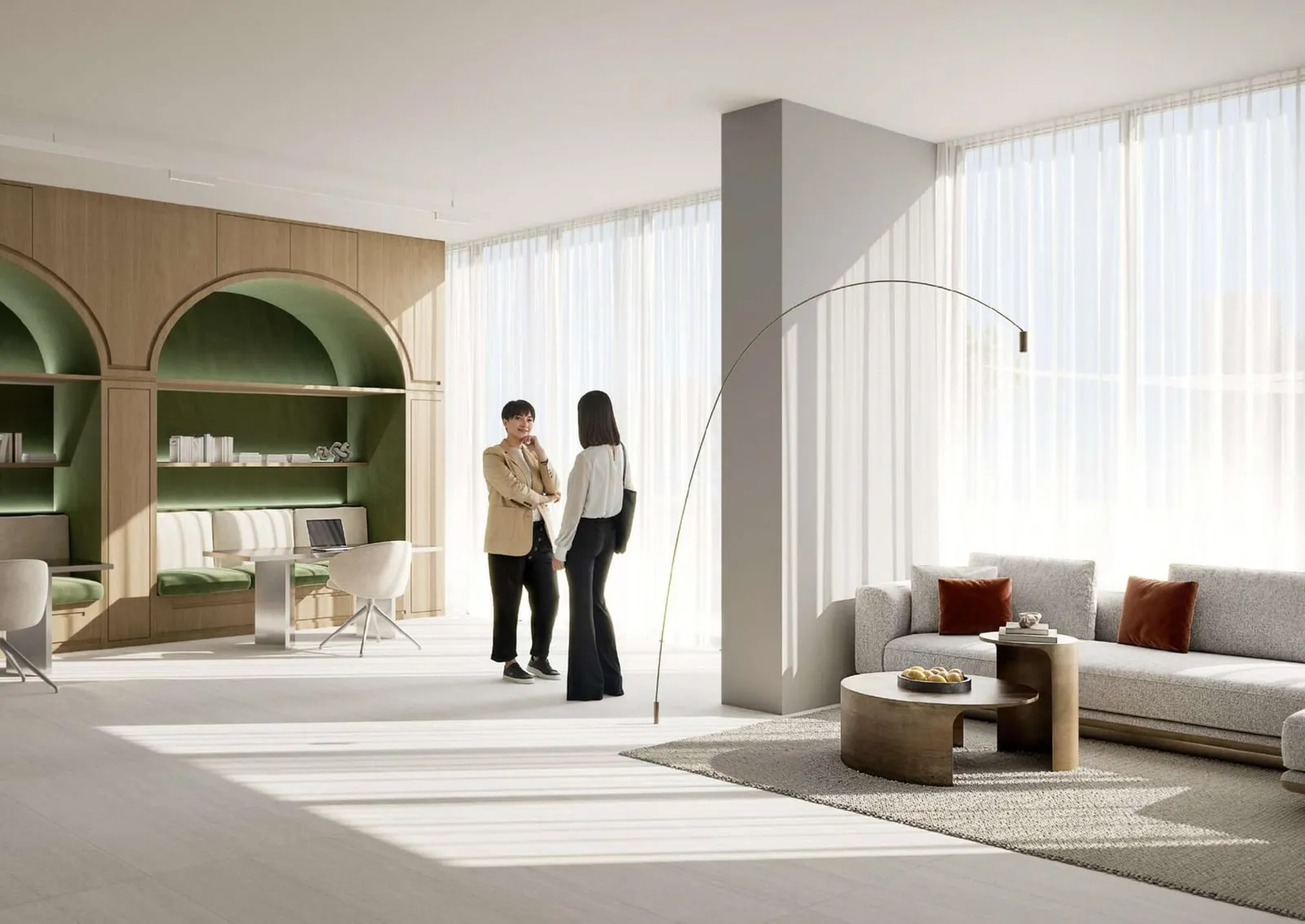 A residents lounge with arched green alcoves and seating turned to the window