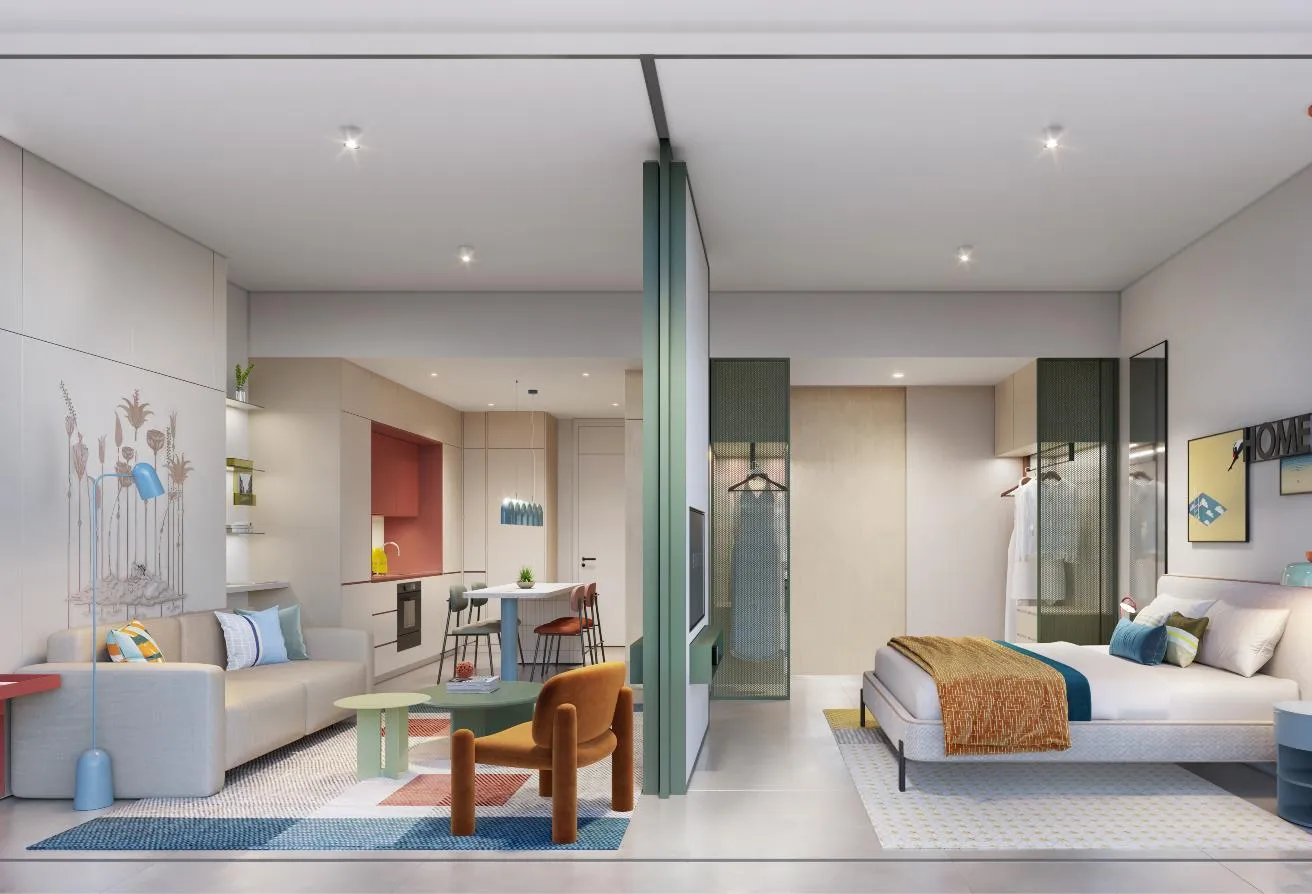 Render of the living area with a sofa and an armchair, the bedroom behind a glass partition on the right