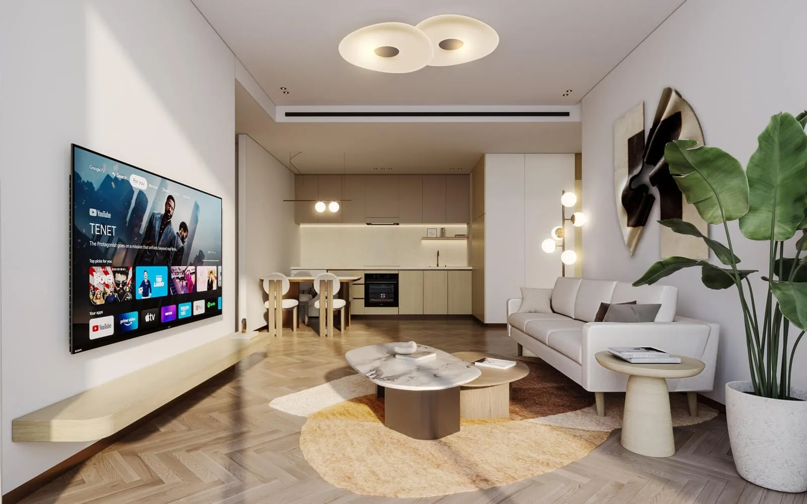 The open plan, a screen on the media wall with the dining table and the kitchen run behind it