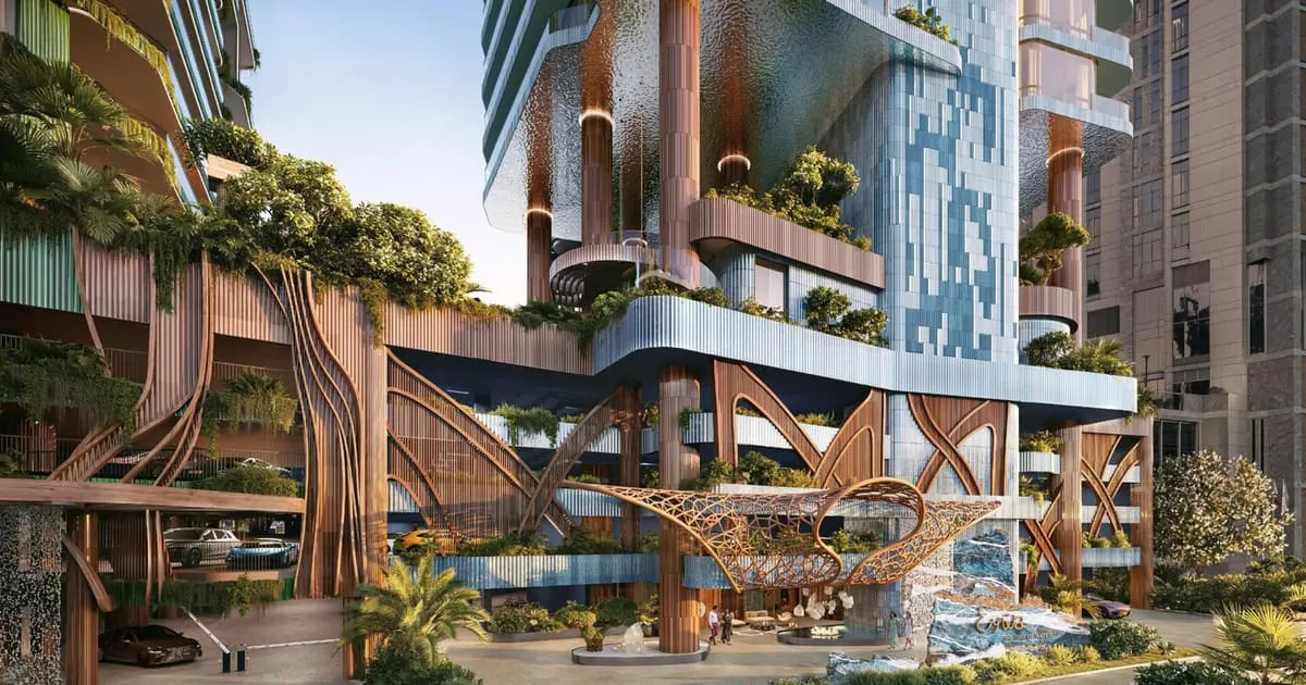The lower levels from the waterside, timber canopies and cascades set into the planted podium terraces