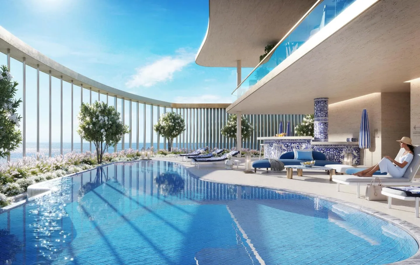 The same pool by day, the bronze screen curving around it and the shoreline beyond
