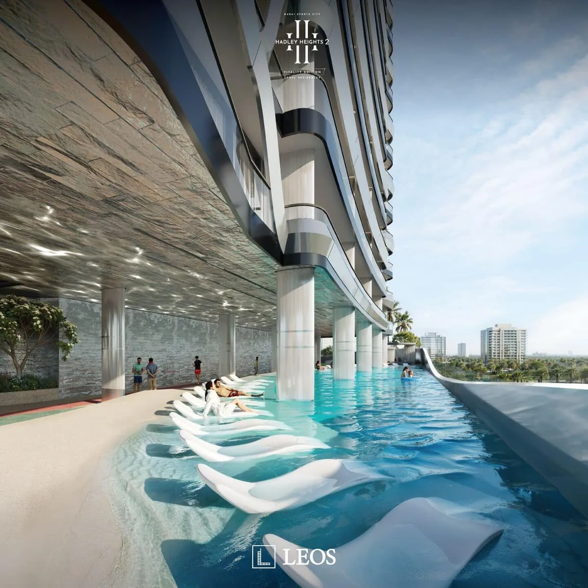 The pool deck under the building, loungers standing in shallow water below the curved marble soffit