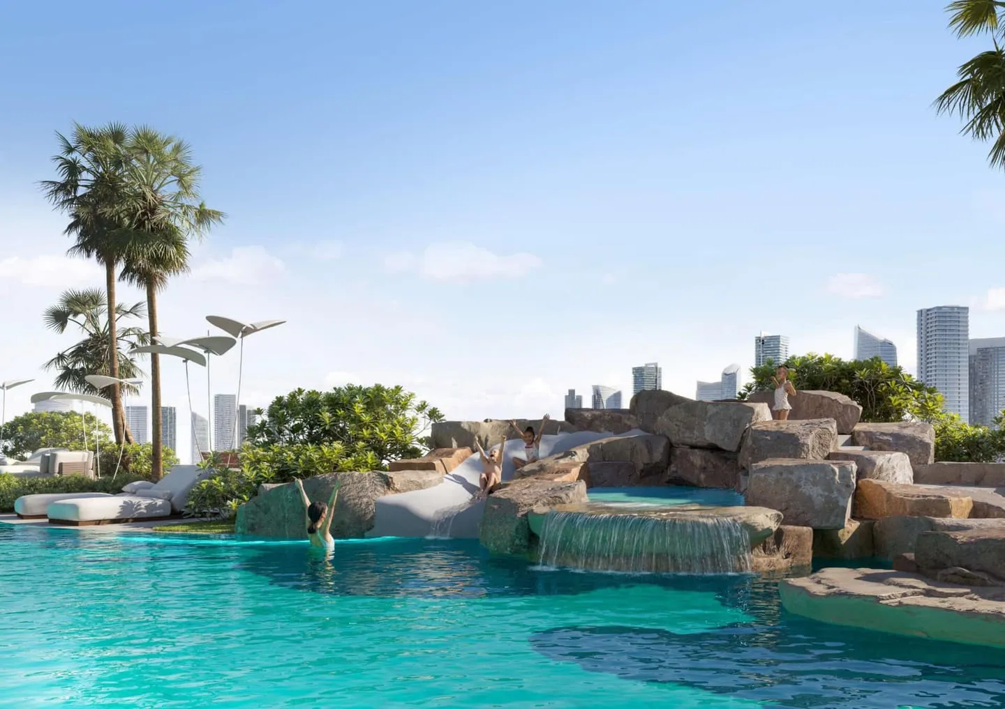 The pool deck with a rock cascade at its edge, the skyline low on the horizon beyond