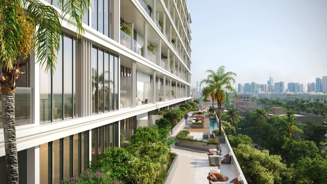 Linea by Holm's low-rise facade beside the landscaped pool deck.