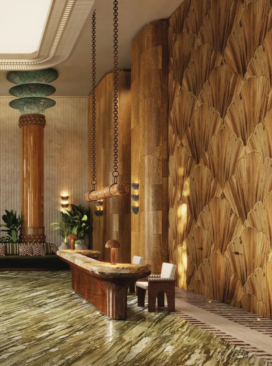 A reception desk against a quilted timber wall, green glass pendants hanging over the counter