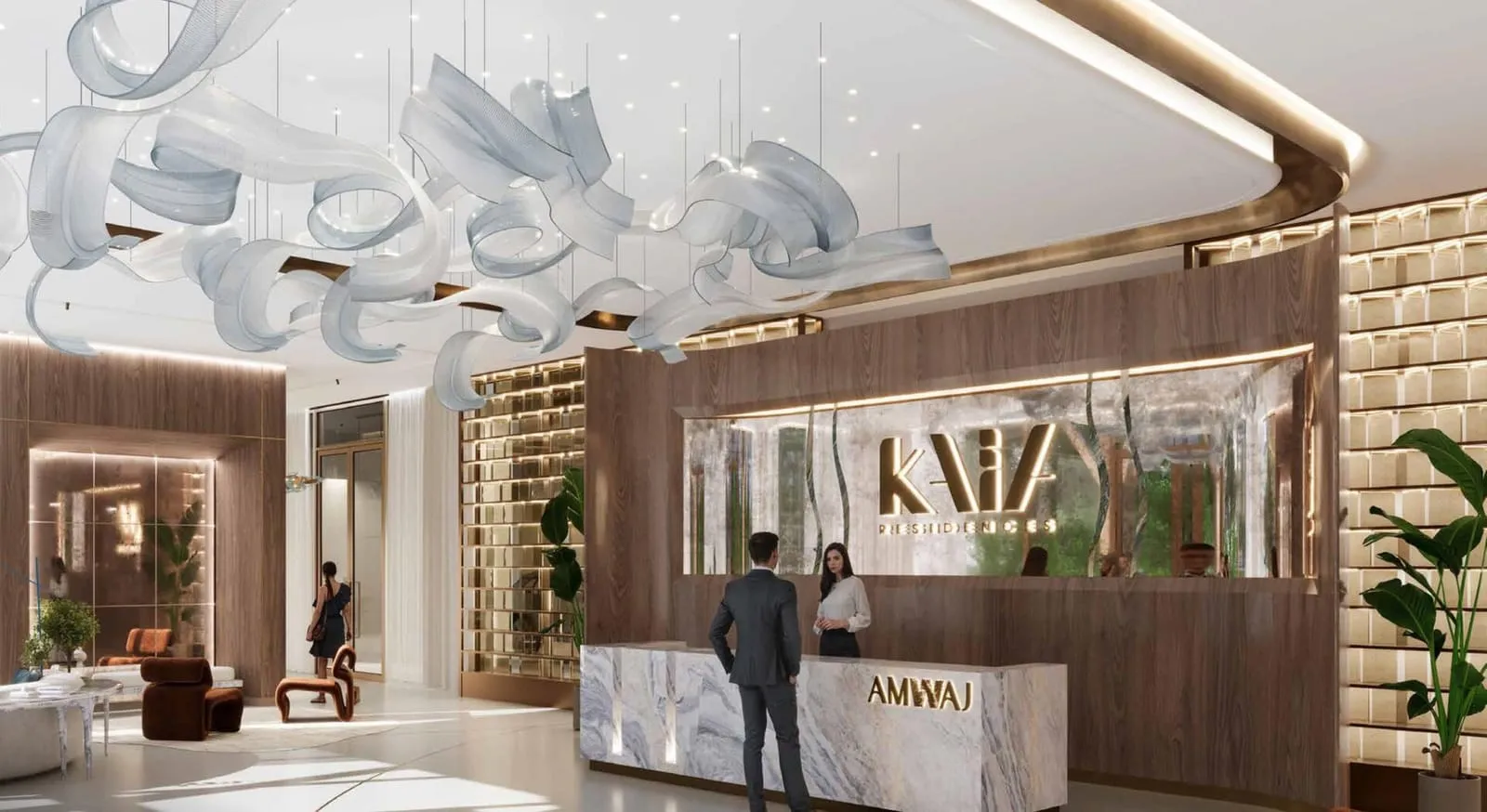 The reception, the Kaia sign on the wall behind the desk and a sculptural white form hung from the ceiling
