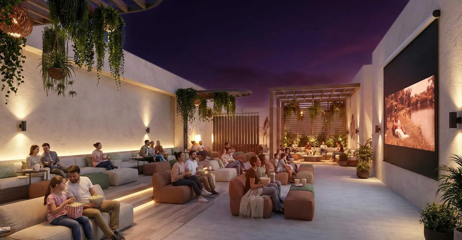 A residents' lounge lit in violet, low modular seating beneath hanging greenery