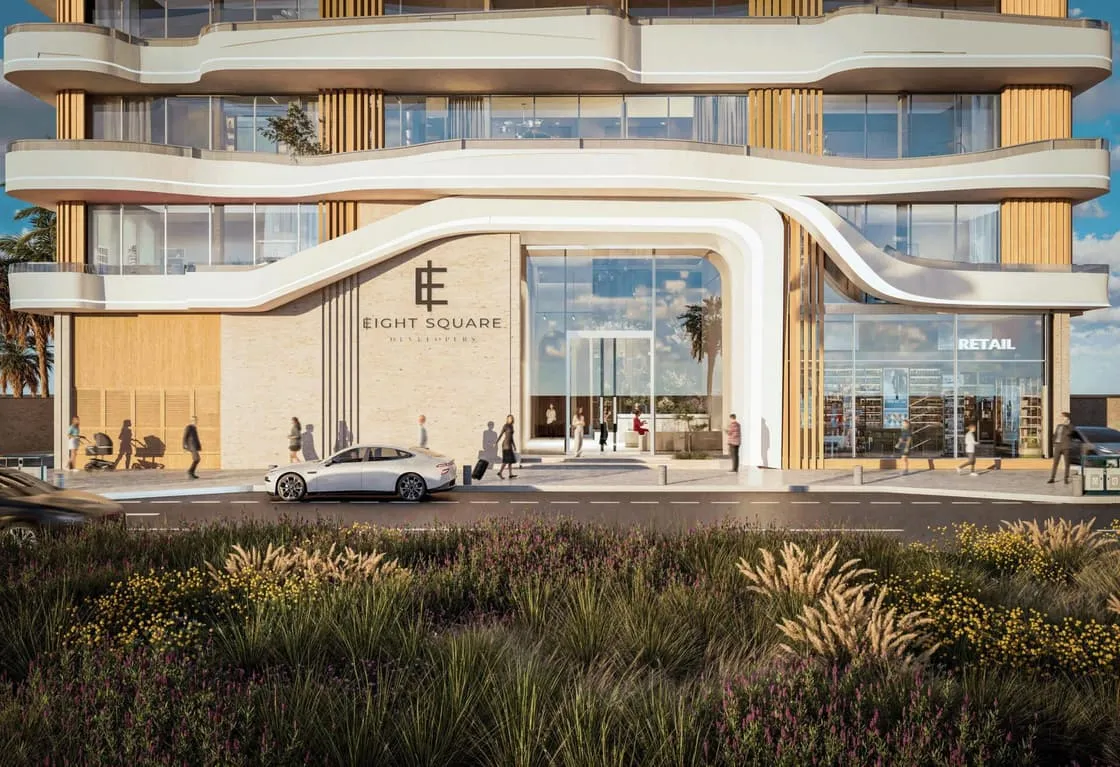 Ground-floor retail entrance at Nooré with the Eight Square Developers signage