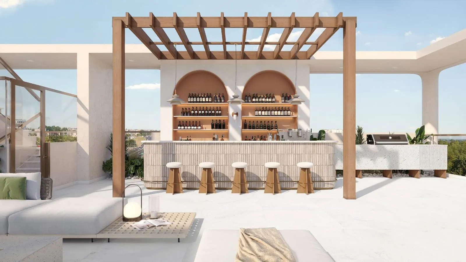 A rooftop bar under a timber pergola, bottles lined along shelving behind the counter