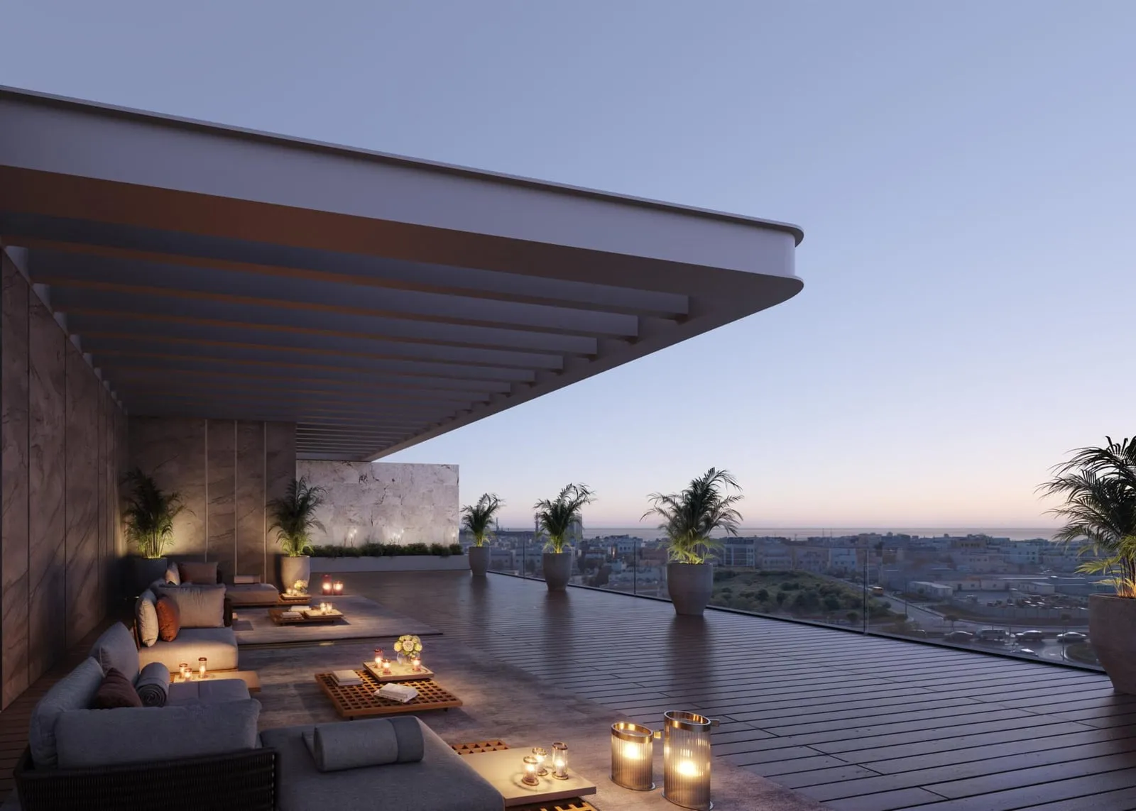 A rooftop lounge under a deep cantilevered canopy, seating turned to the city and the pool edge alongside