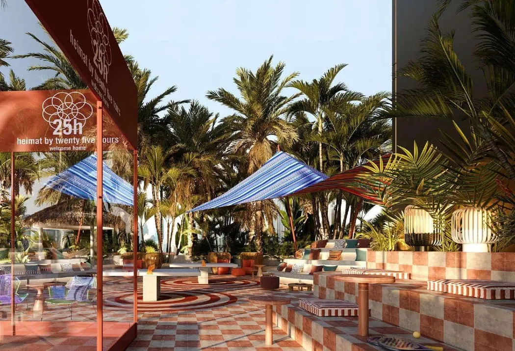 Render of a rooftop garden with palm trees, striped parasols and a 25h welcome sign