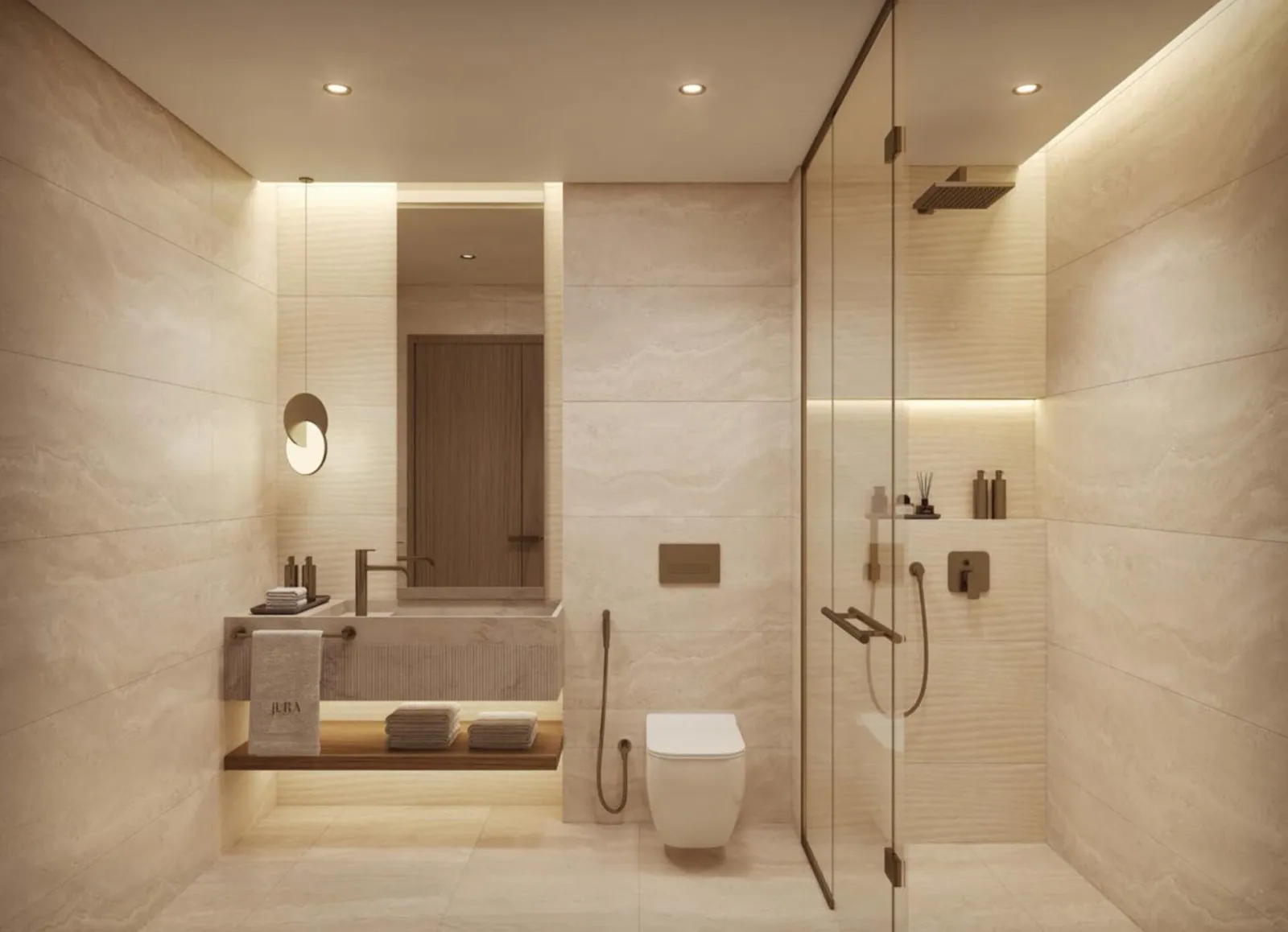 A shower room in pale stone, a ribbed stone basin on a timber shelf and a glass screen beside the shower
