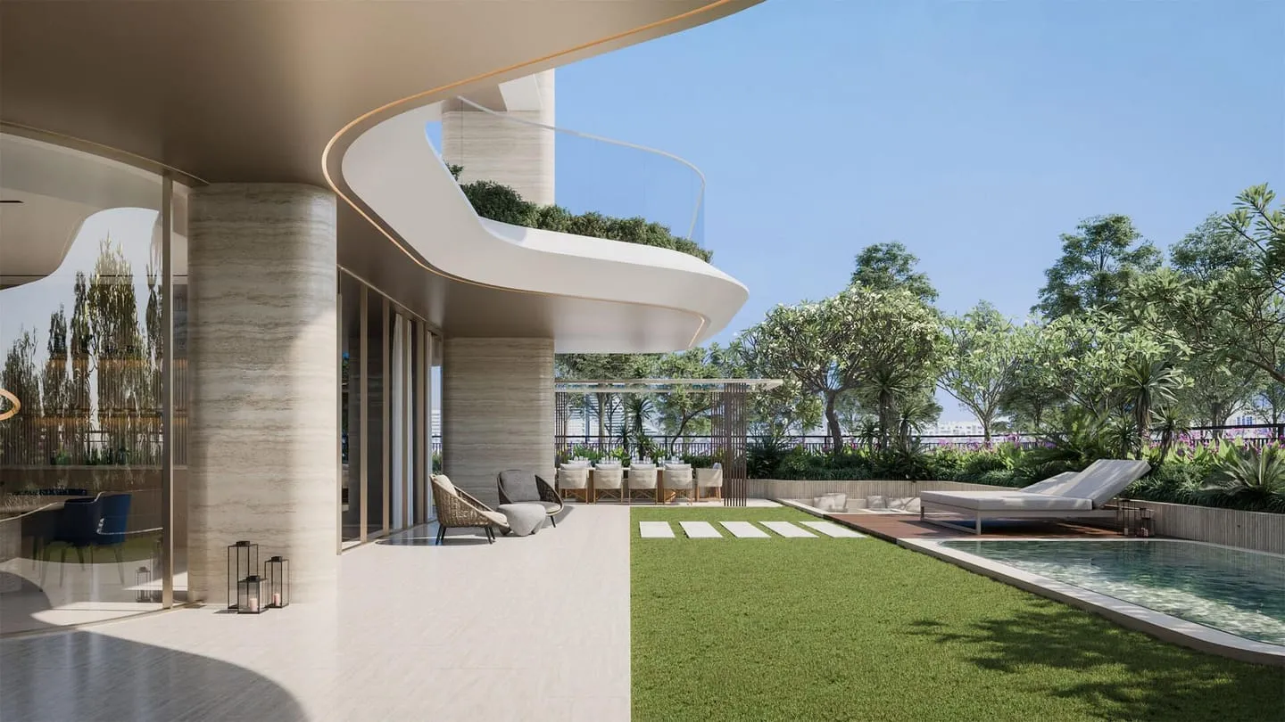 A ground-floor terrace onto the lawn, loungers along the pool edge
