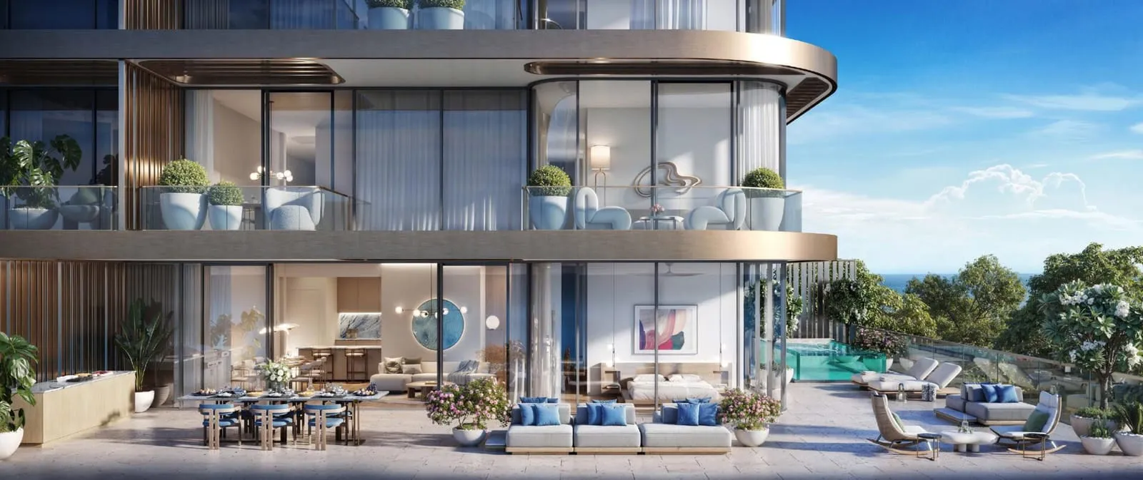 A terrace residence over two levels, dining and lounge seating on the deck and a pool at its edge