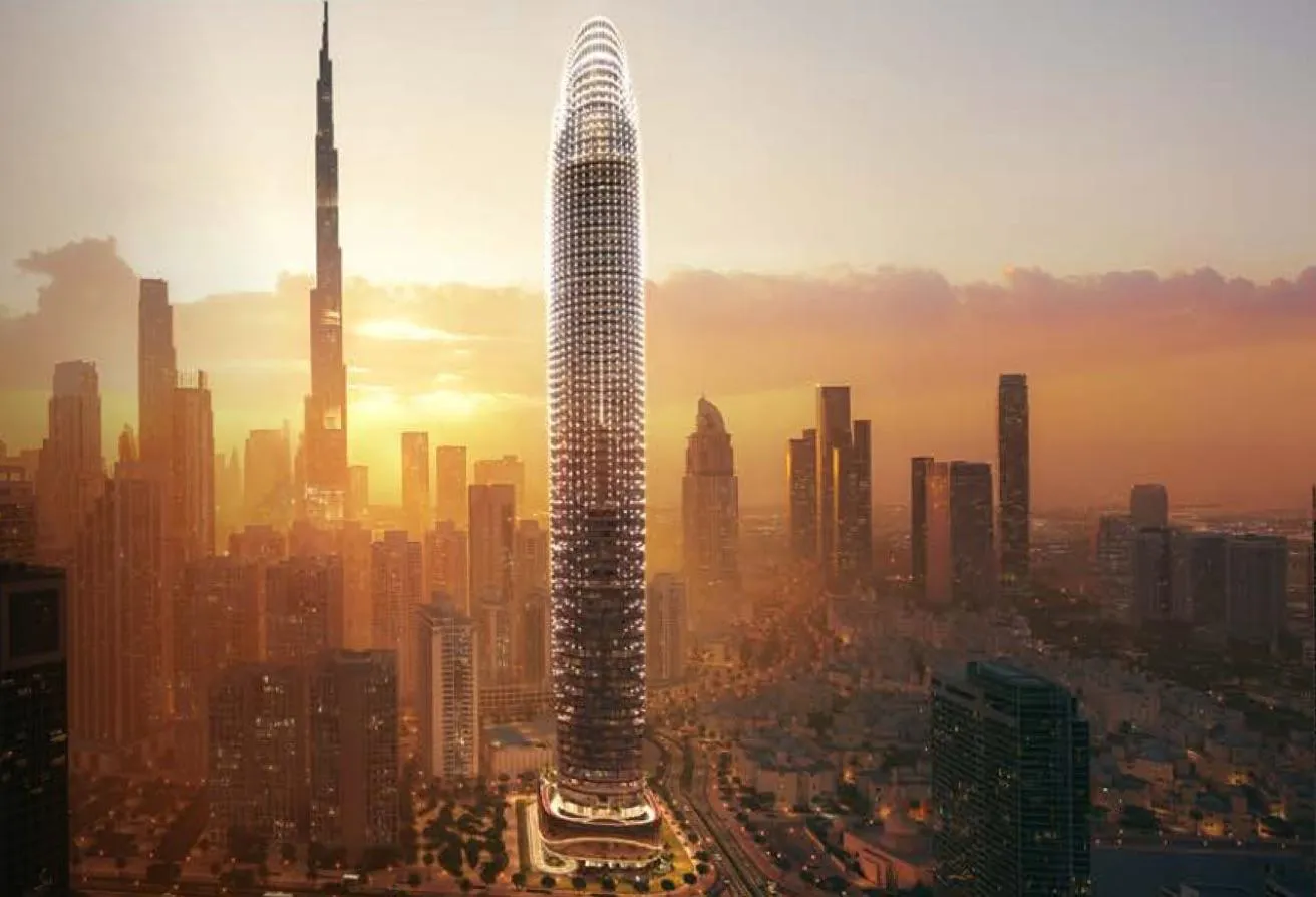 Render of the Binghatti Skyblade tower at sunset, rising to the right of the Burj Khalifa above Downtown Dubai