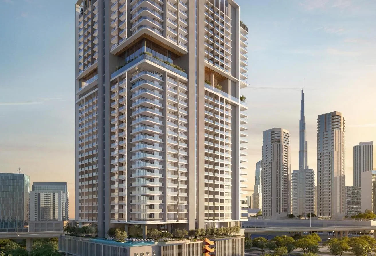 Render of the Rove Home Marasi Drive tower in Business Bay, with Burj Khalifa and the city skyline behind it on the right