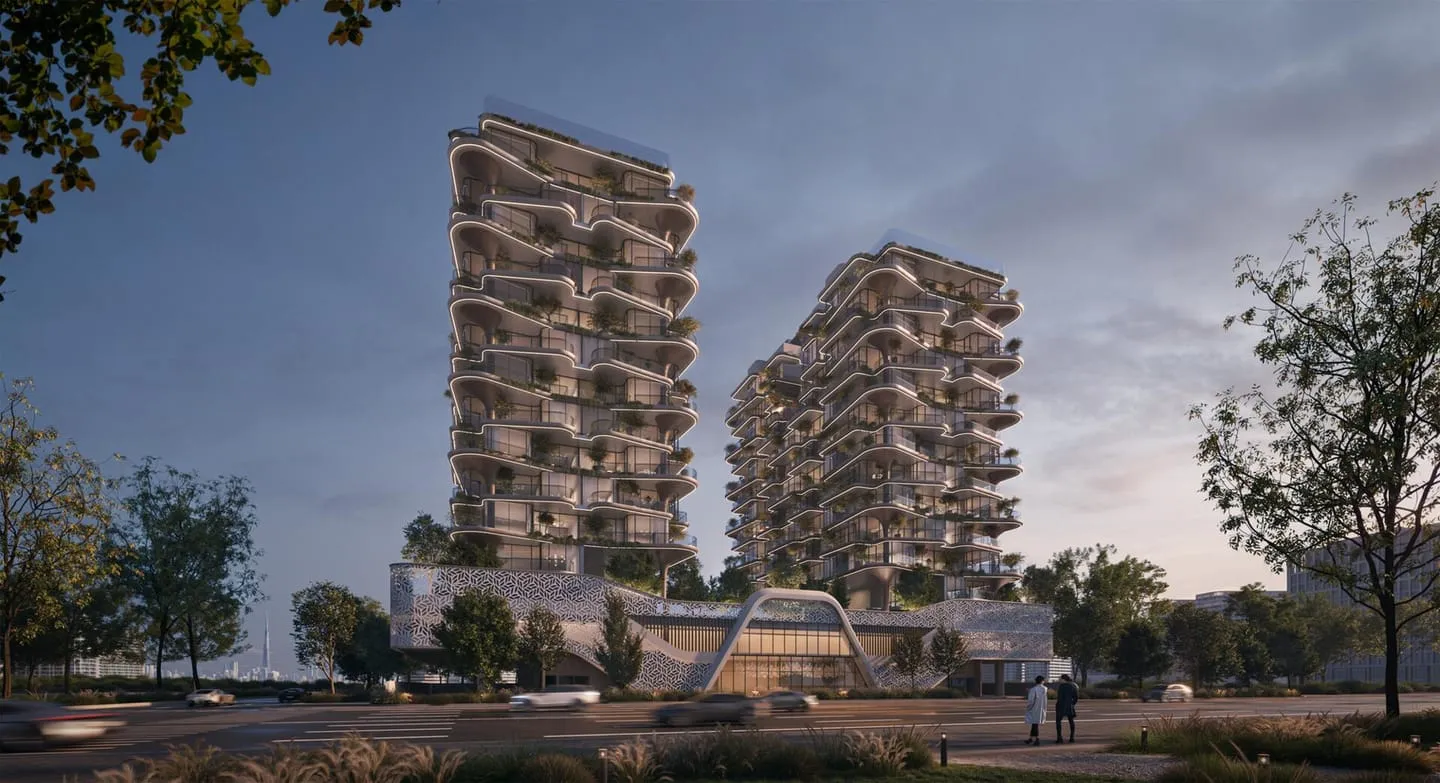 The twin towers seen from the surrounding gardens on the approach to the development.